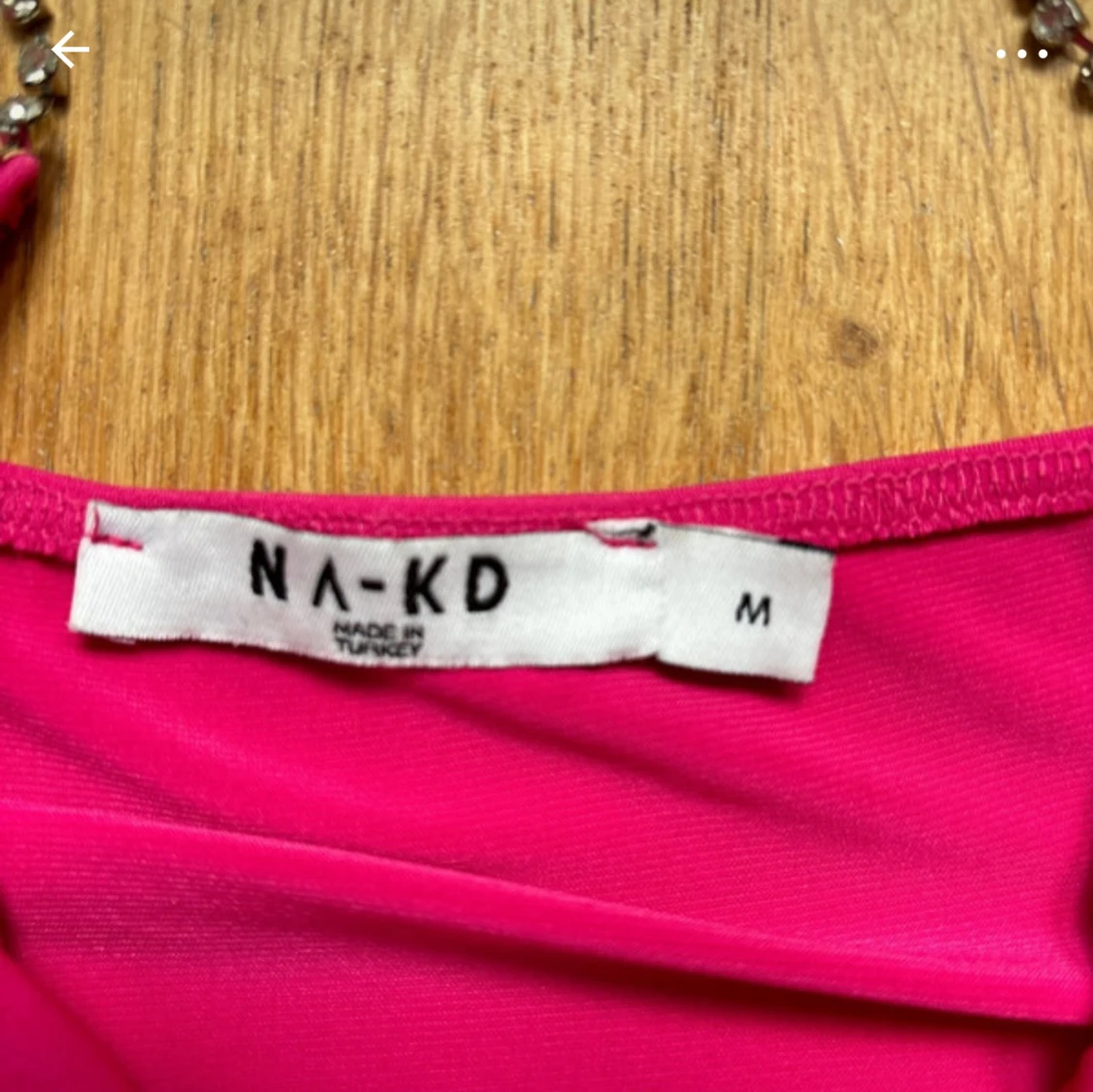 Rosa topp med strassband från NA-KD. M - 1