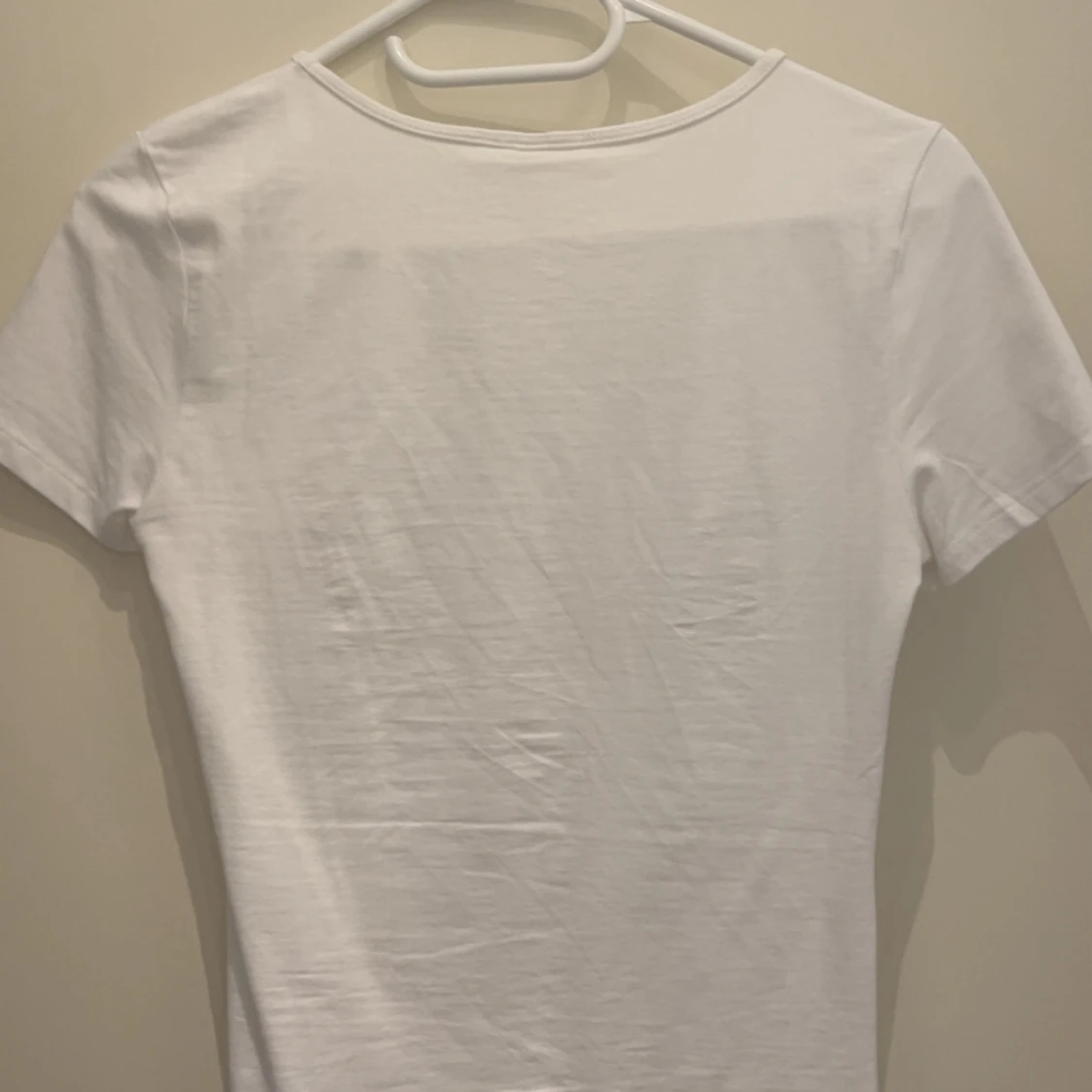 Slimmad T-shirt från H&M - 1