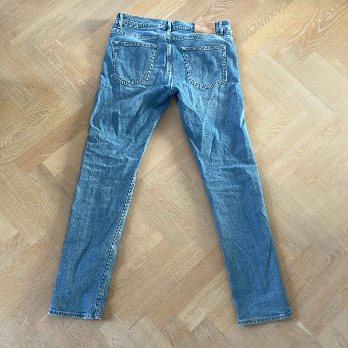 Blå slim fit jeans från J.Lindeberg - 1