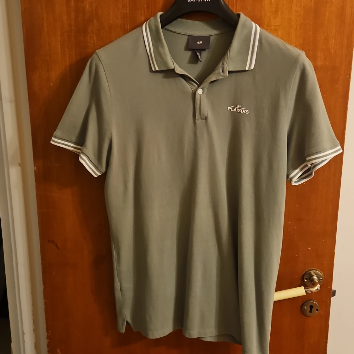 Grön pikétröja från H&M, strl L