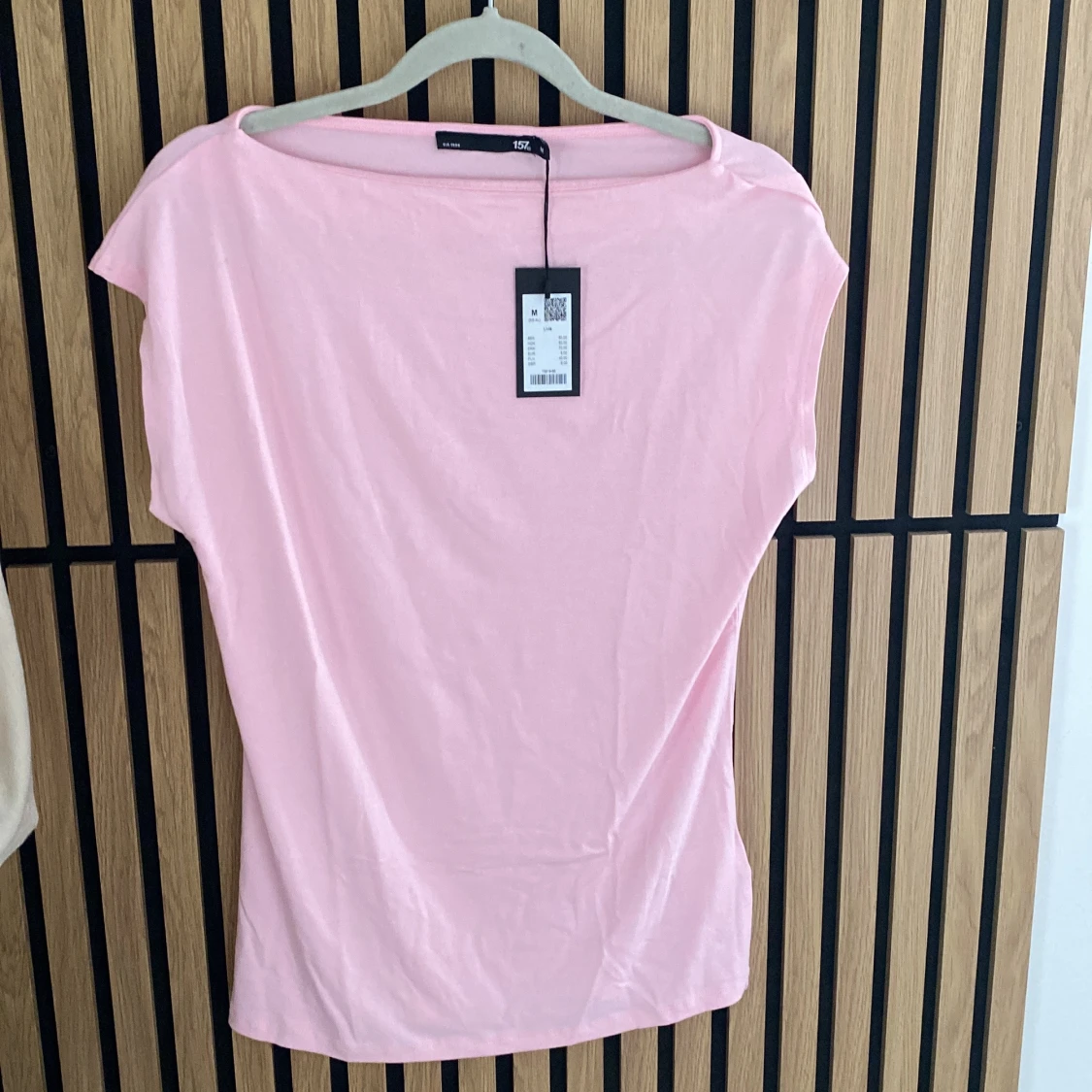 Ljusrosa topp från 157 