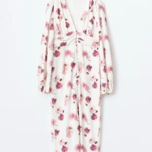 Balloon sleeve dress - Virala klänningen från Ginatricot som är slutsåld. Helt ny bara testad i storlek 42, alla lappar är kvar. Pris går att diskutera 