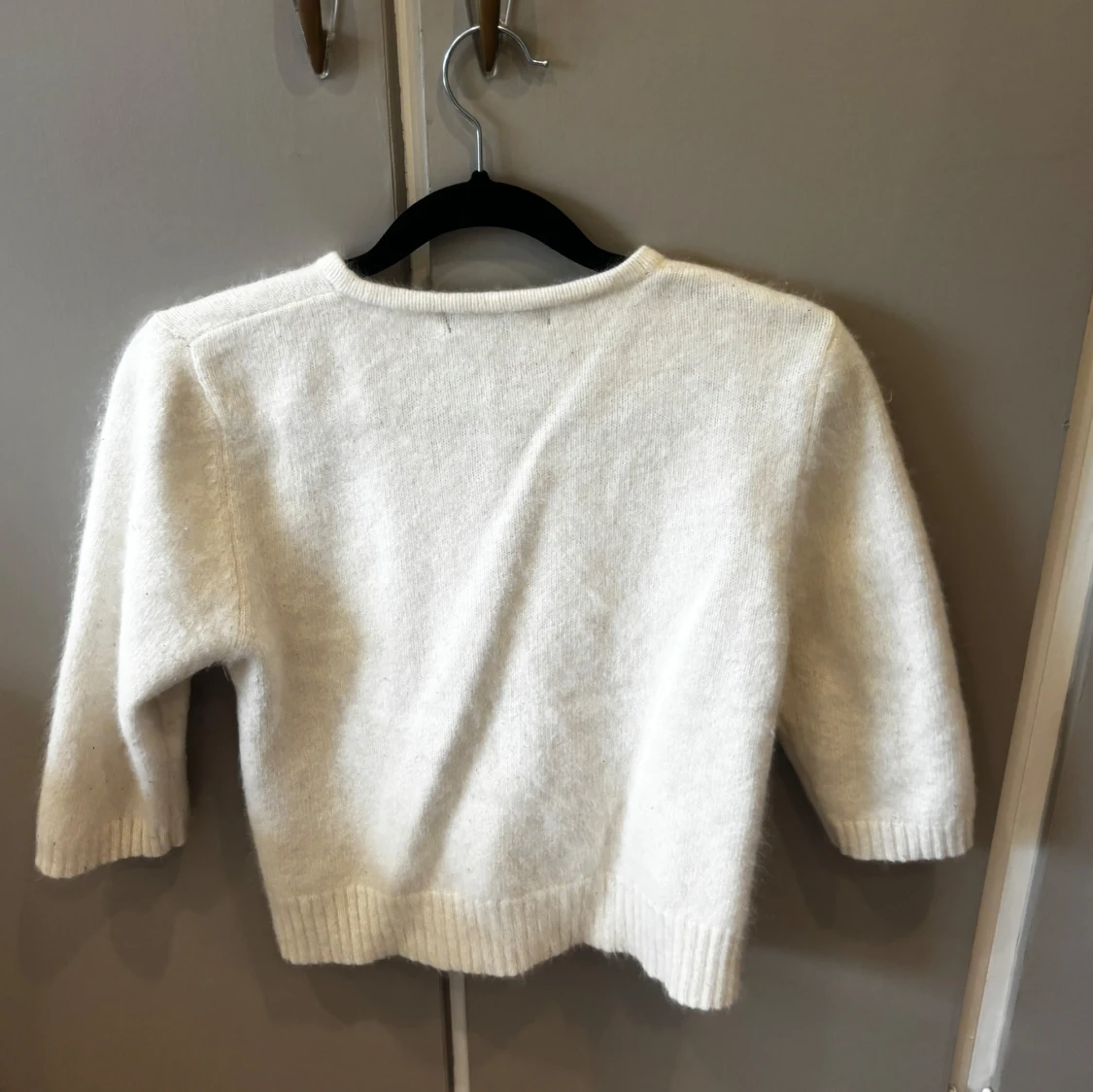 Tre kvarts stickad kofta - 1