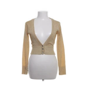 Guldig bolero - Så snygg köpt second hand nyligen men mycket bra skick.