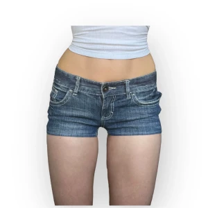 Lowrise jeans shorts - Im selling these lowrise jeans shorts from Mossimo, size 5 (fits an S in my opinion) Measurements: waist across: 37cm and total length: 23cm. Feel free to reach out if you have any questions about other measurements or details! they are pants sewn into shorts💕