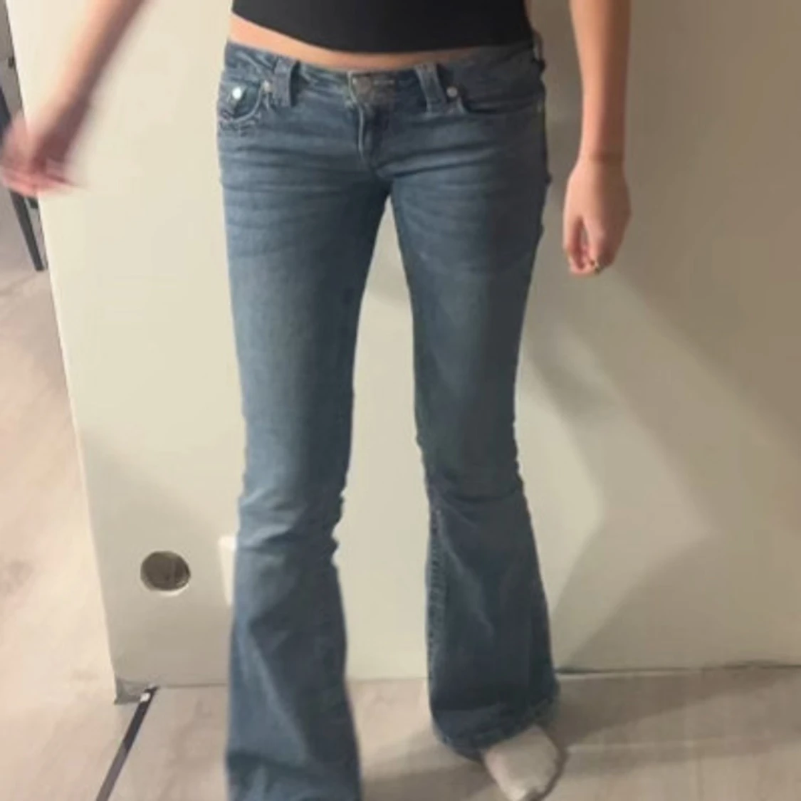 Blå bootcut jeans