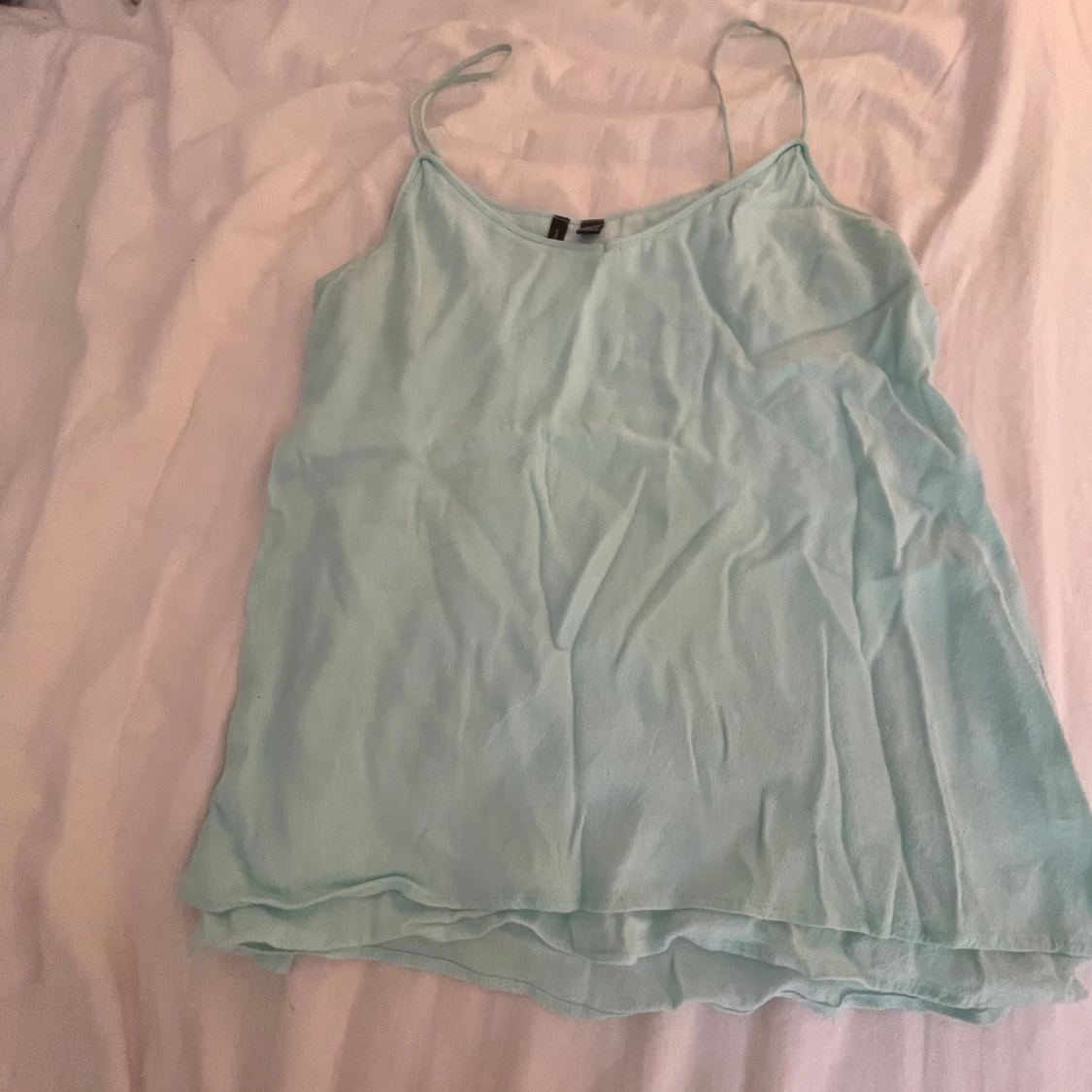 Ljusblått linne från Mango