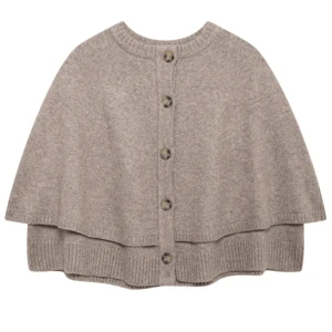 Zara tröja  - Säljer en beige stickad kofta med rund hals och knäppning framtill. Helt ny 