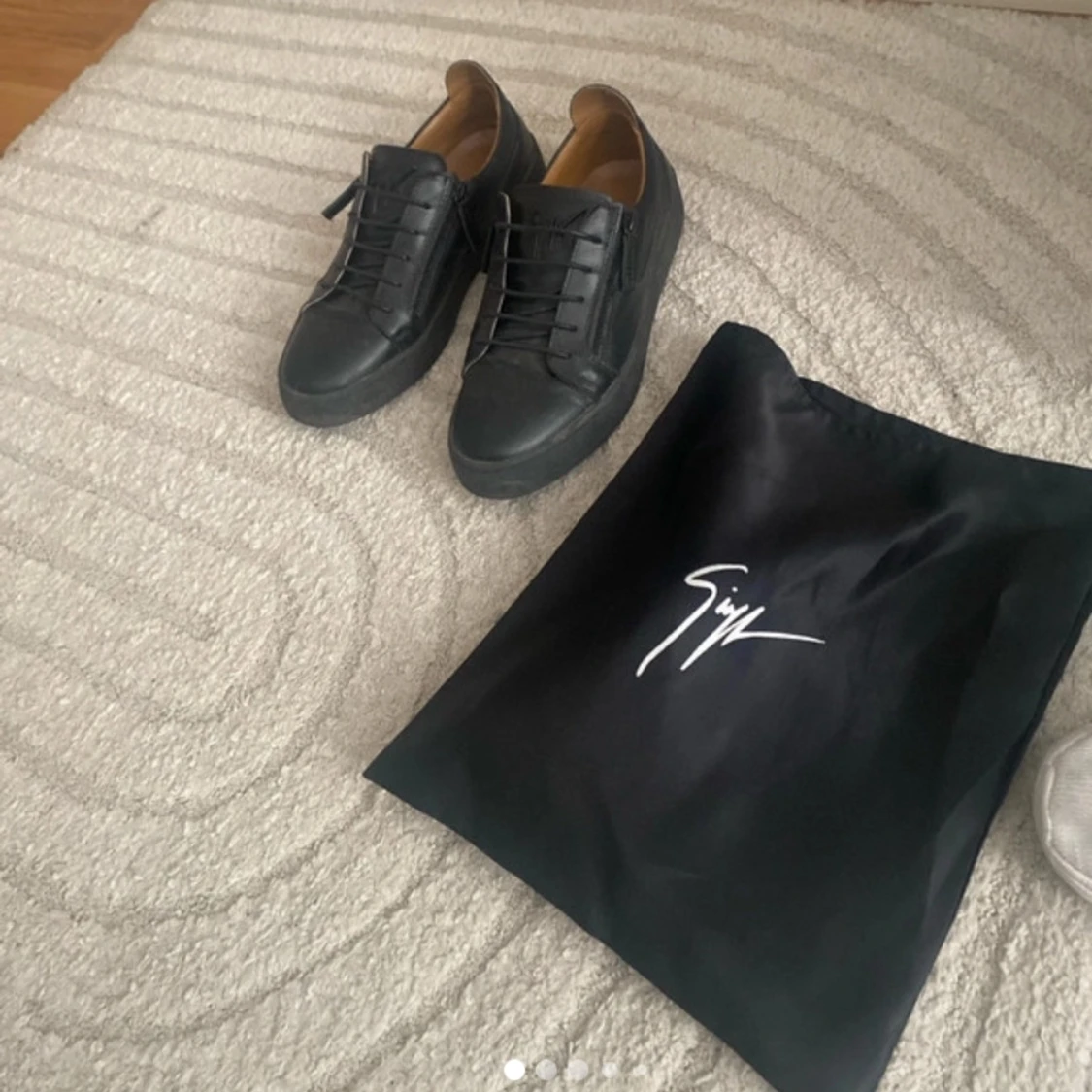 Svarta sneakers från Giuseppe Zanotti