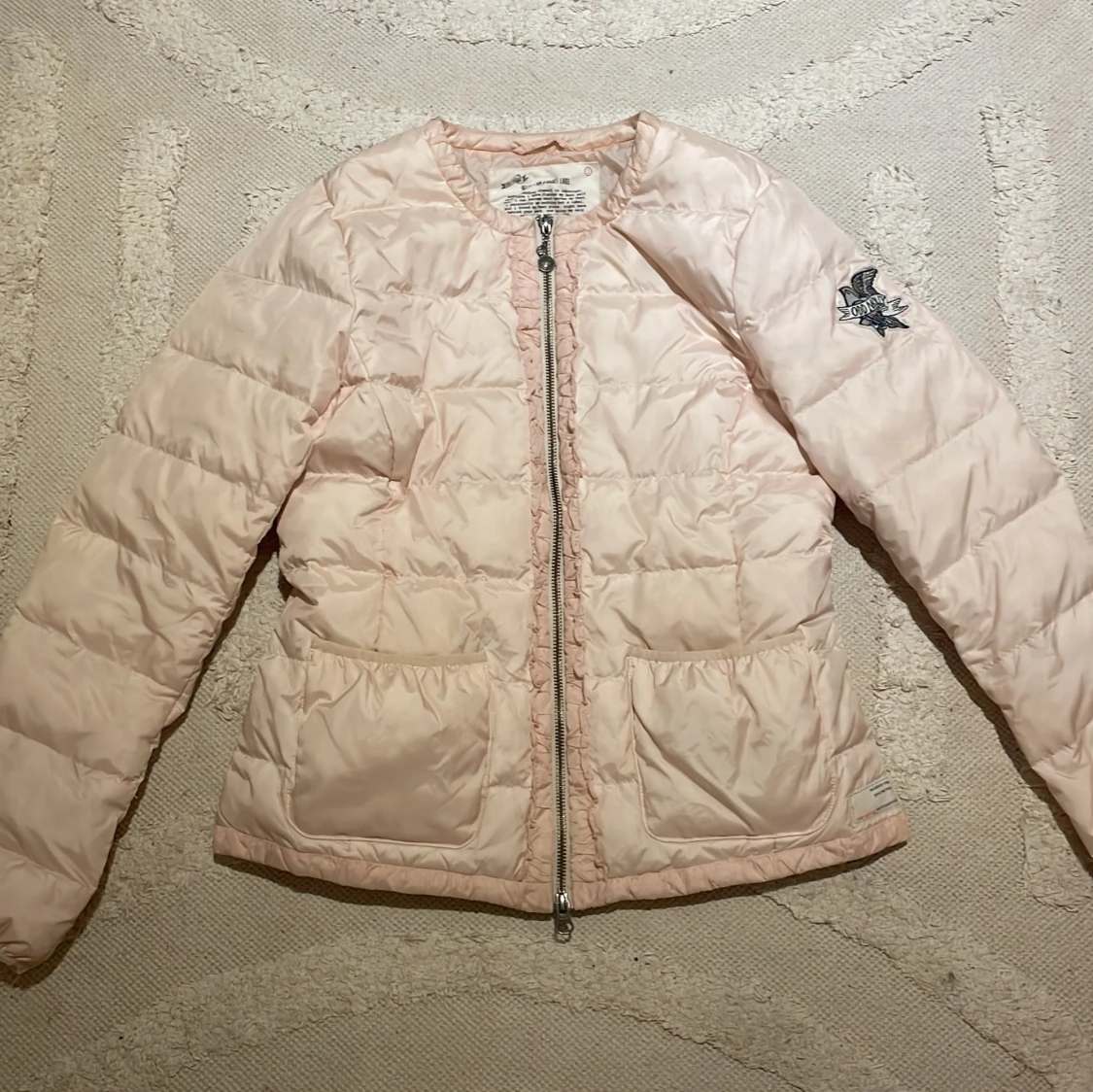 Ljusrosa dunjacka från Odd Molly