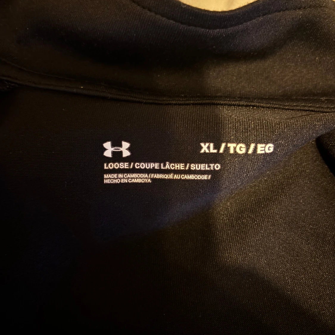 Svart långärmad träningströja från Under Armour - 1