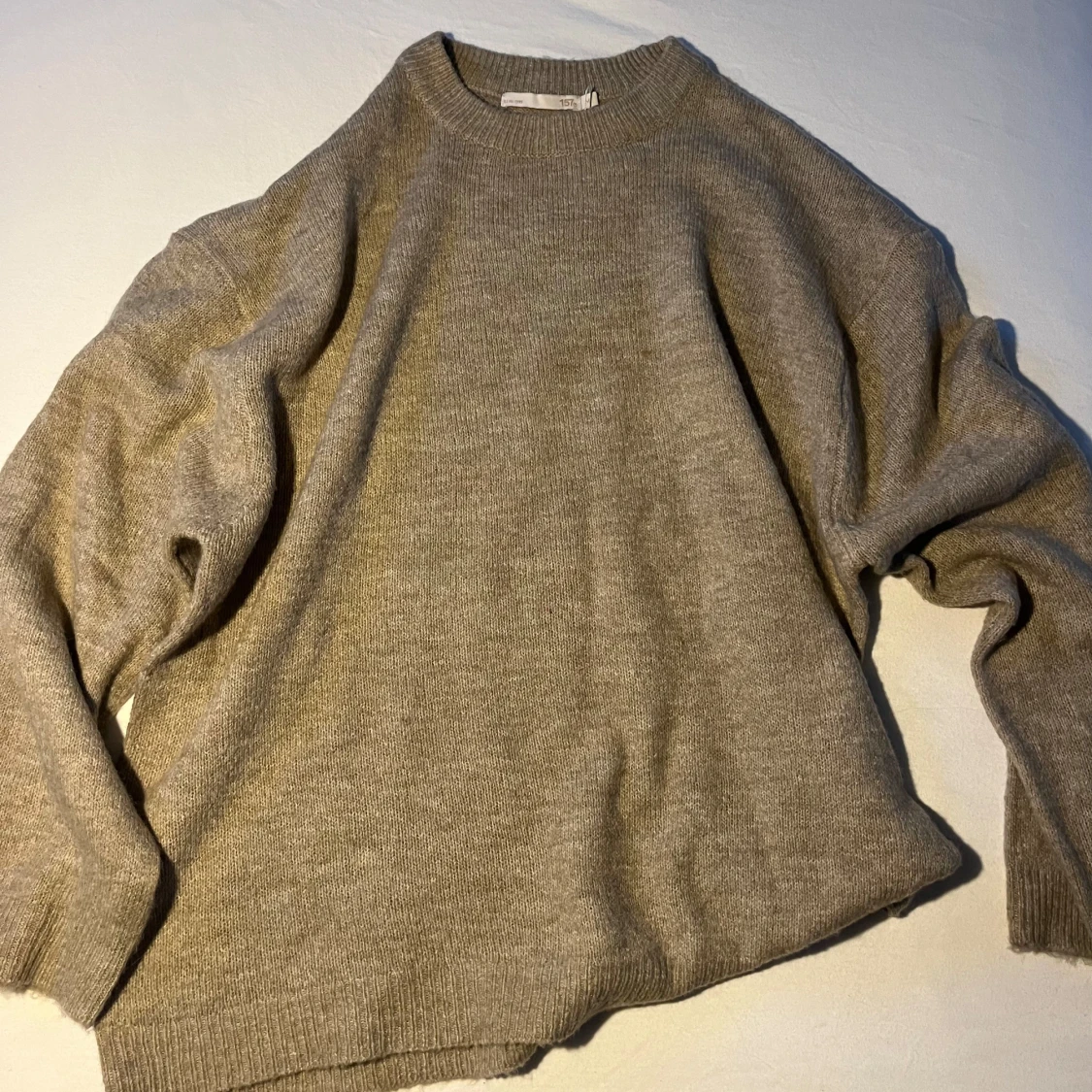 Beige stickad tröja