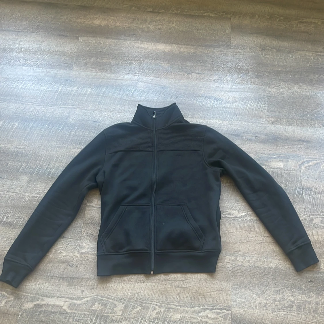 Svart zipjacka från Michael Kors