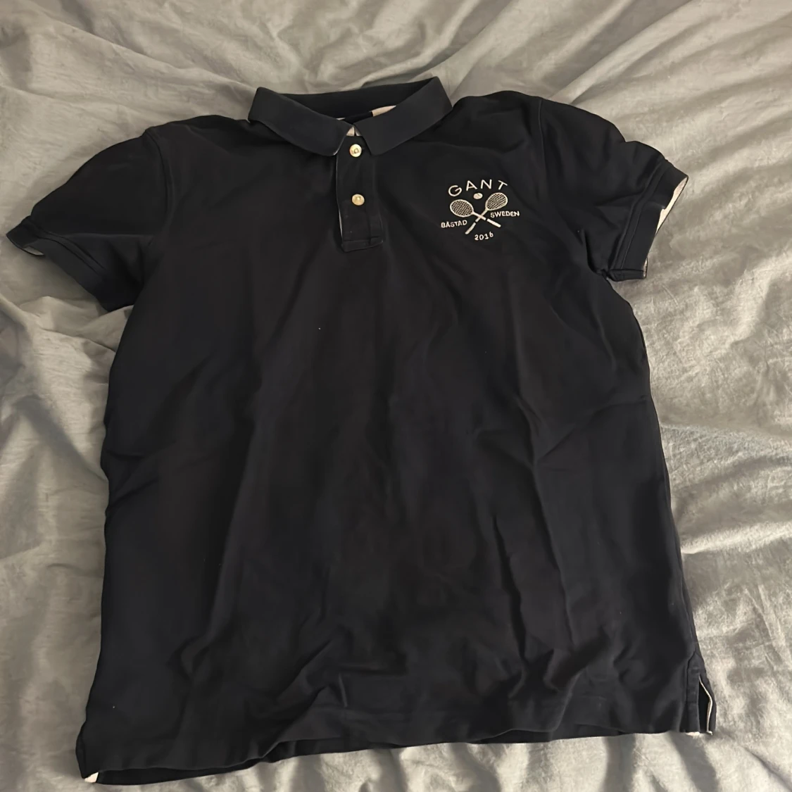 Svart pikétröja från GANT