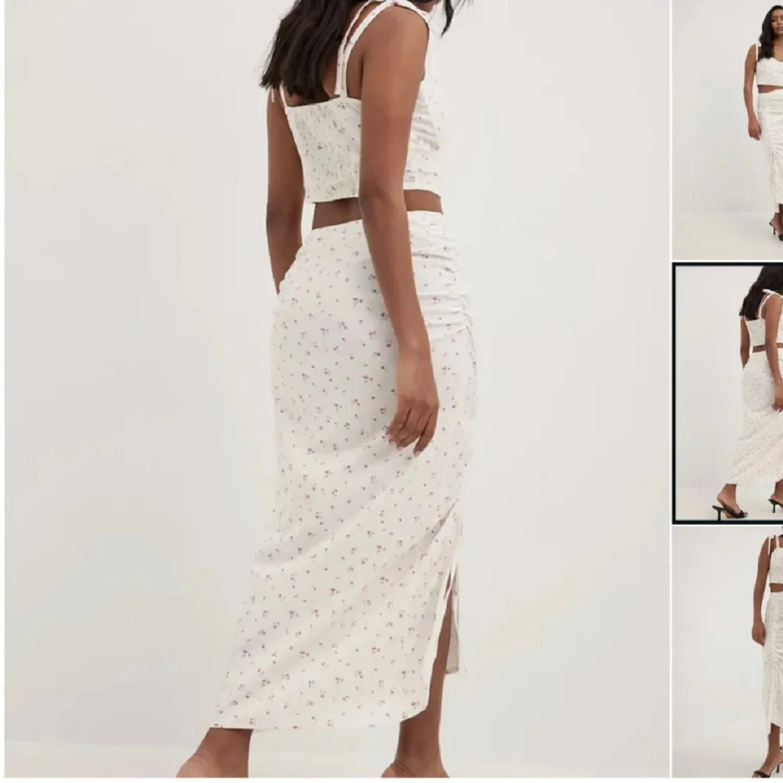 Vit långkjol med småblommigt mönster och slits - 1