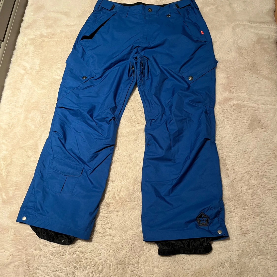 Blå täckbyxor från Sessions