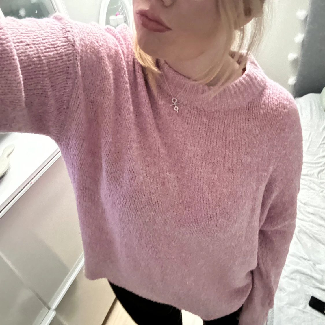 Ljusrosa stickad tröja