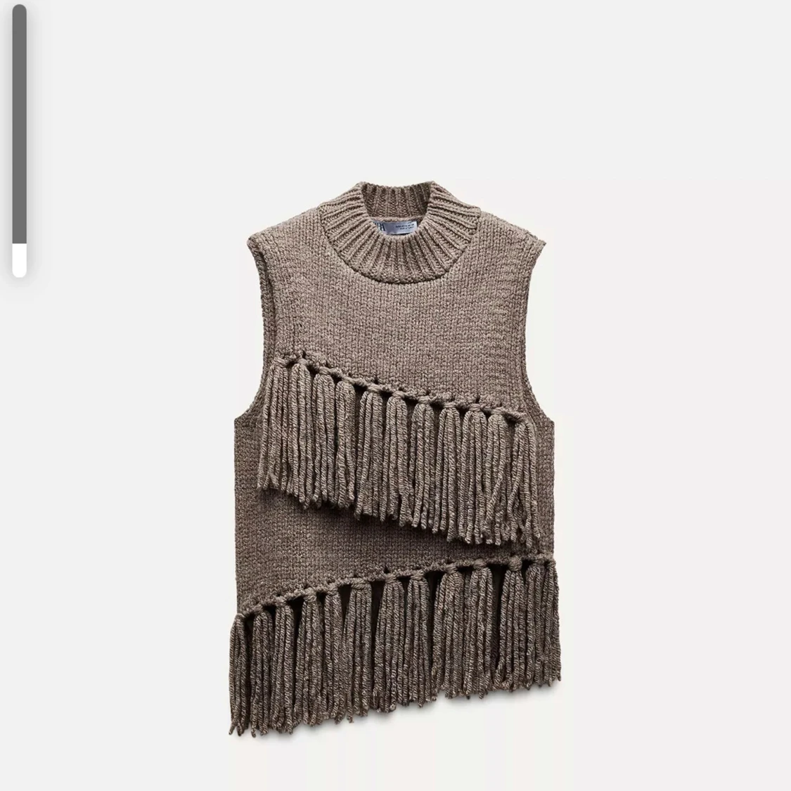 Brun stickad väst med fransar