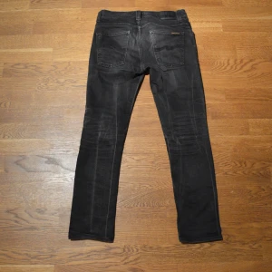 Nudie Jeans - Svarta Skinny Nudie Jeans