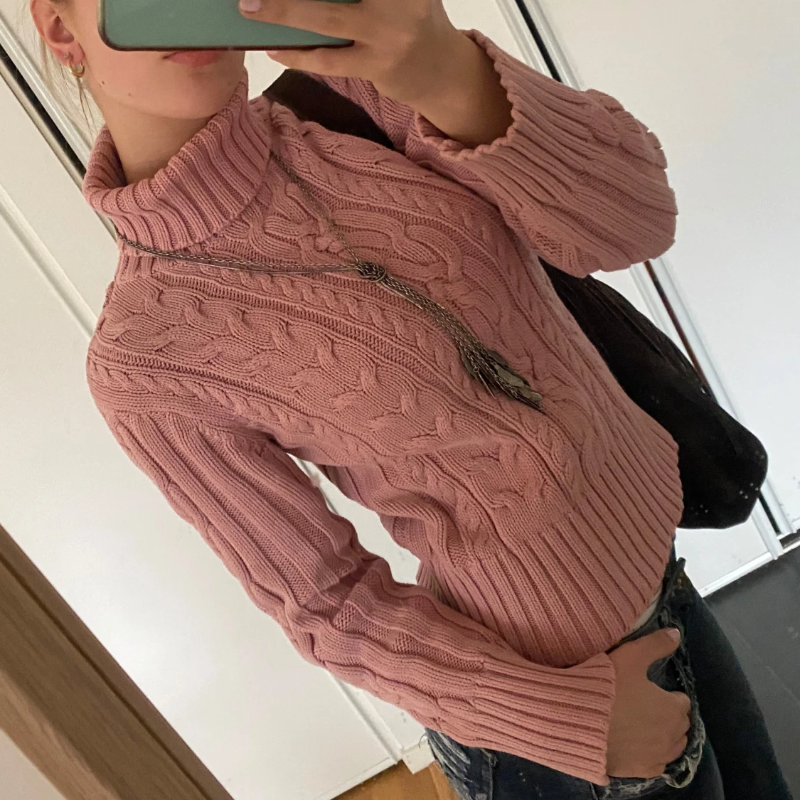 Rosa stickad polotröja