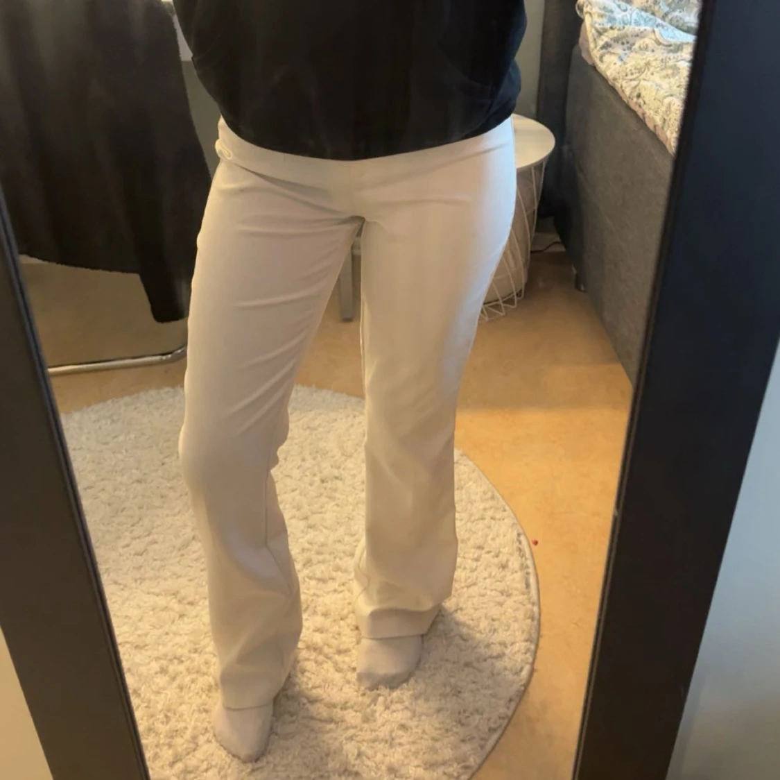 Vita kostymbyxor 