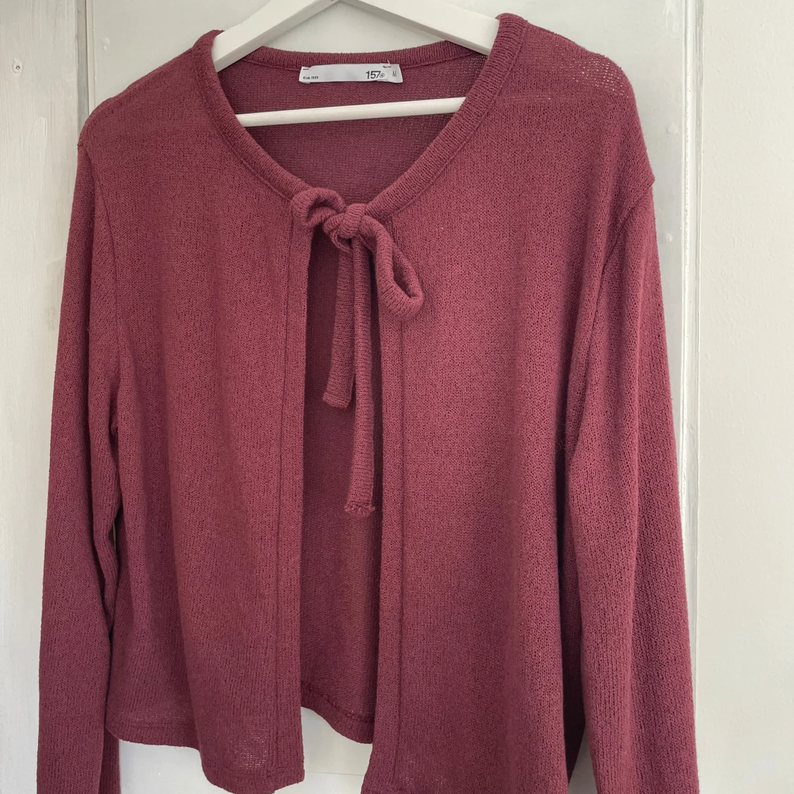 Rosa kofta med knyt från 157
