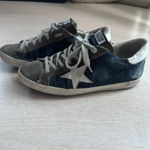 Golden goose sneakers - Golden goose sneakers som jag köpt här på Plick men som inte kommer till användning. Lånade bilder av tjejen jag köpte de av