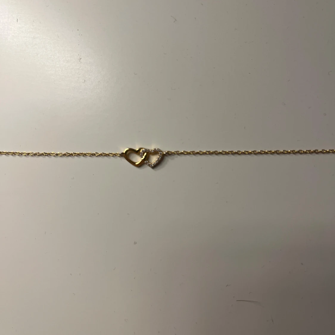 Guldarmband med hjärtan - 1