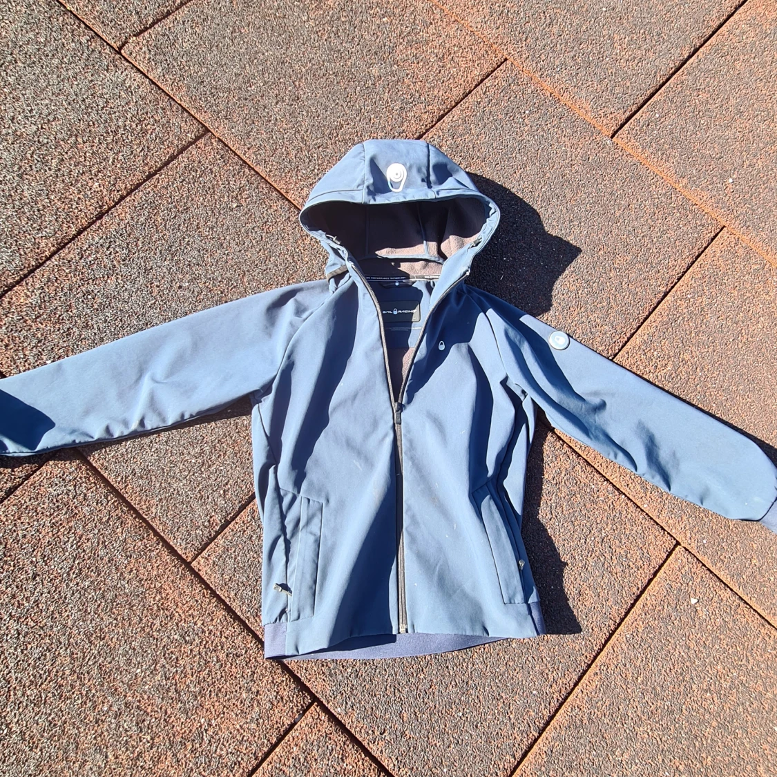 Blå vindjacka från Sail Racing