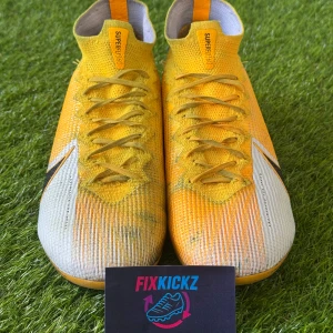 NIKE MERCURIALSUPERFLY 7 ELITE FG DAYBREAK - ORANGE/SVART/VIT - Feta ACC cleats i size 46