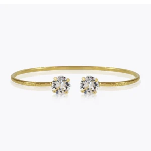 Caroline Svedbom armband - Guldigt armband från caroline svedbom som går att ”töja” när man ska sätta på sig det, aldrig använt då jag inte använder guld❤️