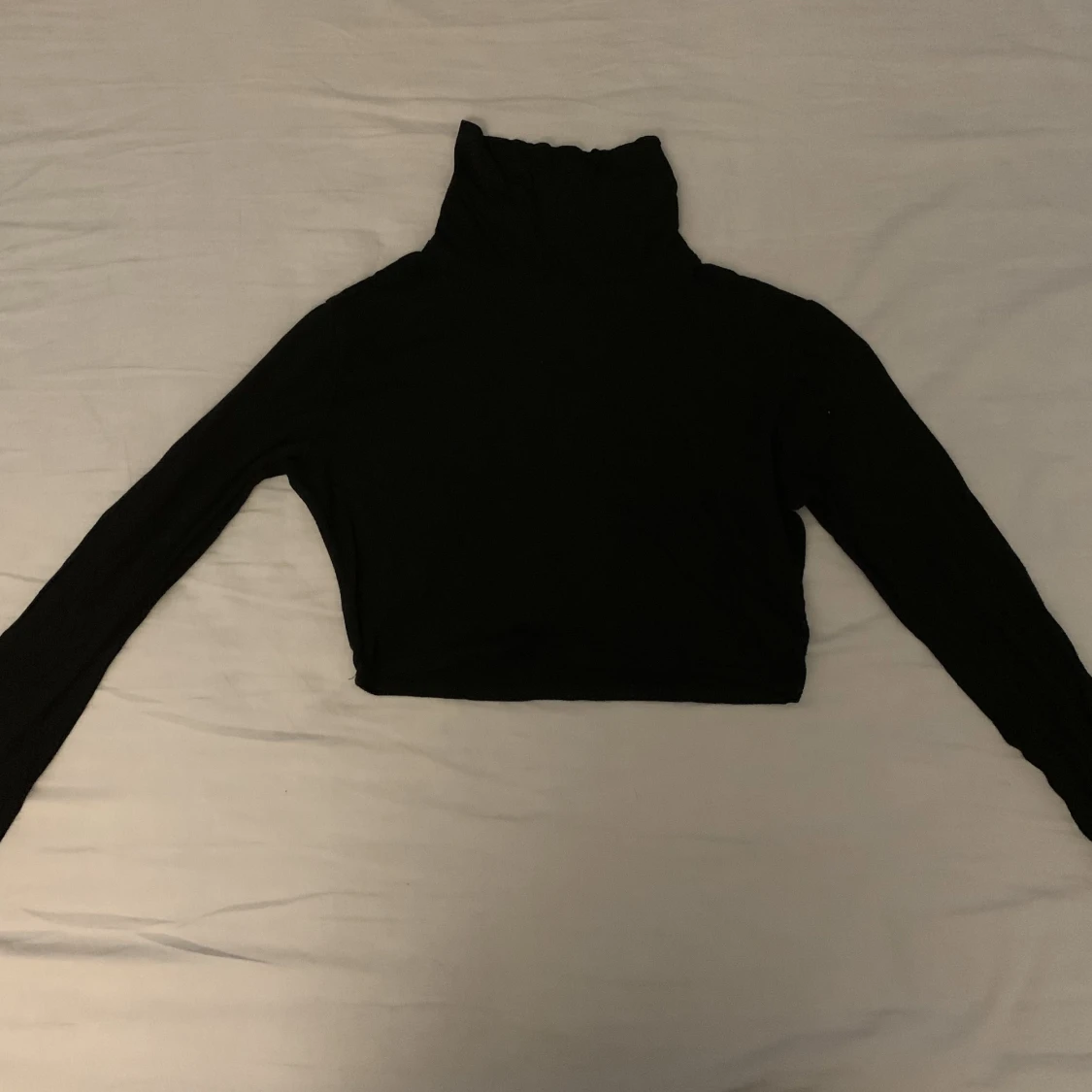 Svart långärmad croptop