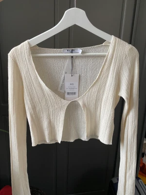 Topp - Long sleeve top, never used, new condition 