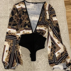 Body  -  Snygg body  Aldrig använd  Storlek xs