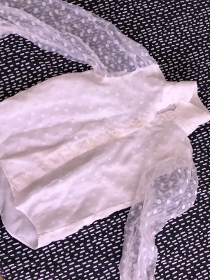 Cute blouse - White blouse with cute round dots around. If you like classy looking clothes would recommend! 