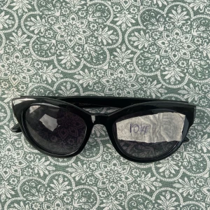 Solglasögon  - Skriv för frågor