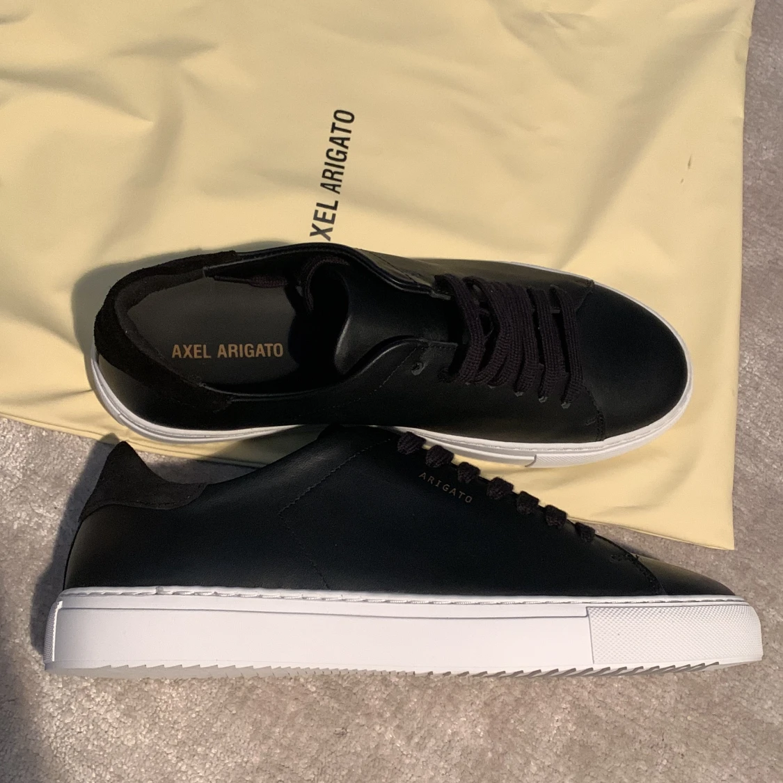 Axel Arigato skor