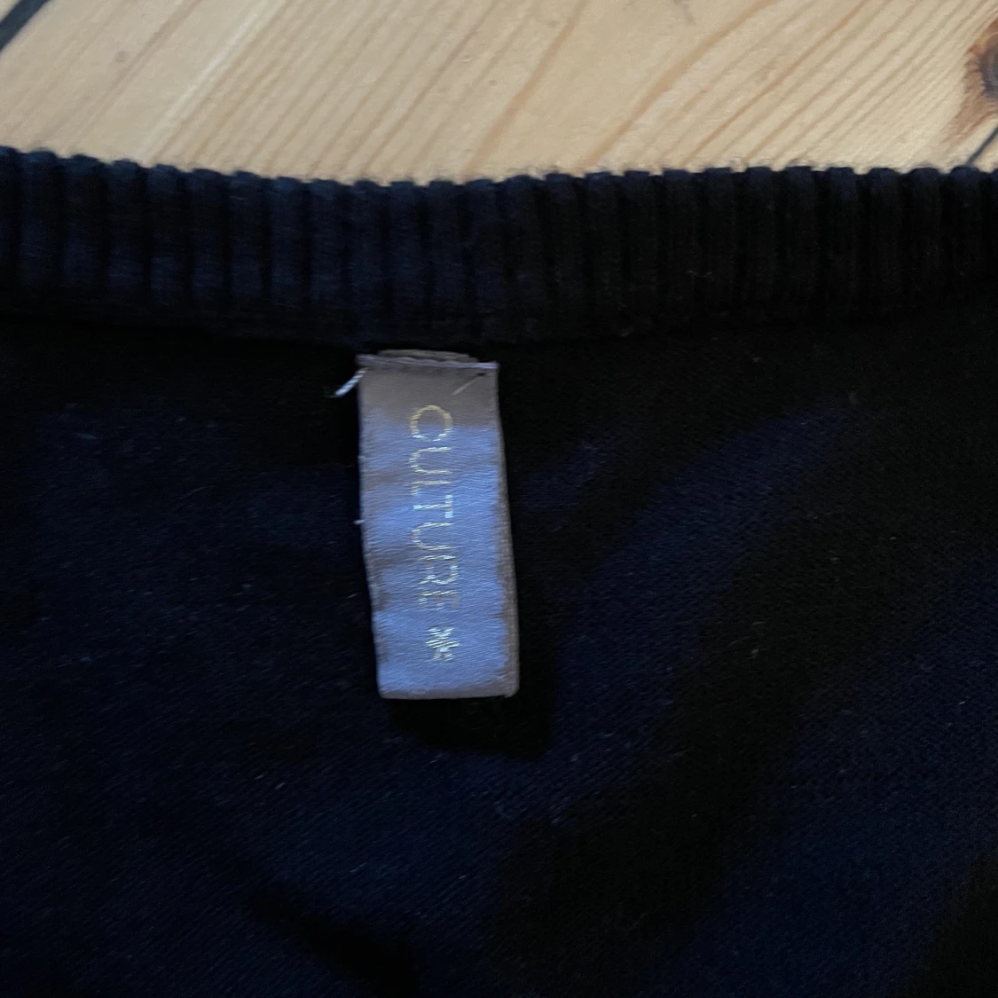 Svart kofta med stjärnor  - 91