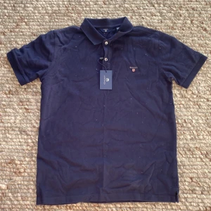 Gant piké  - En Gant piké storlek 158/164 cm  helt ny 