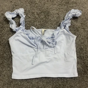 Ljusblått gulligt linne - Aldrig använt. Mycket bra skick. Storlek S.