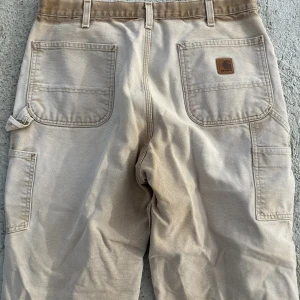 Vintage  carhartt - Säljer nu dessa vintage carhartt, sjukt fin fade på dom  36 midja  32 längd  