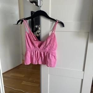 Rosa topp - Rosa topp som e super fin, jag är dock osäker på vilket märke det är 