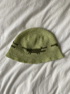 Virkad hatt - Virkad hatt i 100% bomull. 