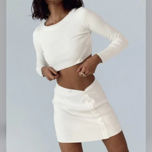 Kjol och tröja - Strl S