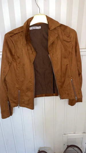 Mockaimitation storlek 34 - Från NA-KD 