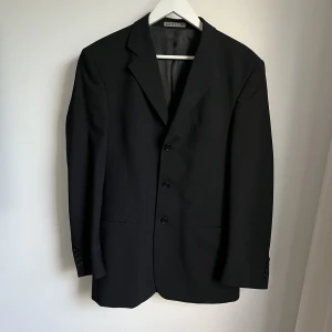 Kavaj - Jätte fin kavaj i strl L med fickor ute och inne 