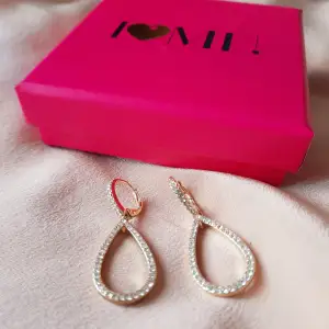 Beautiful earrings, new, in perfect condition.  Never worn. Come in a pink box and make the perfect gift.