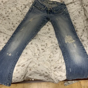 Lågmidjade jeans - Fina lågmidjade jeans i storlek xs och 78cm höft tyvärr för små för mig 
