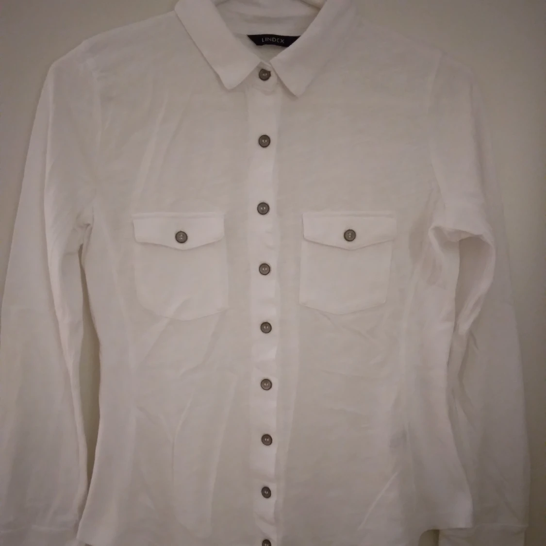 Vit jersey blus / skjorta. Mjuk bomull. Strlk: XS-SMALL. Lindex 