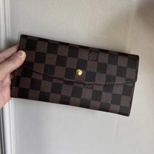 Plånbok - Rök- och djurfritt hem. Helt ny, oanvänd. Jättefin kopia!